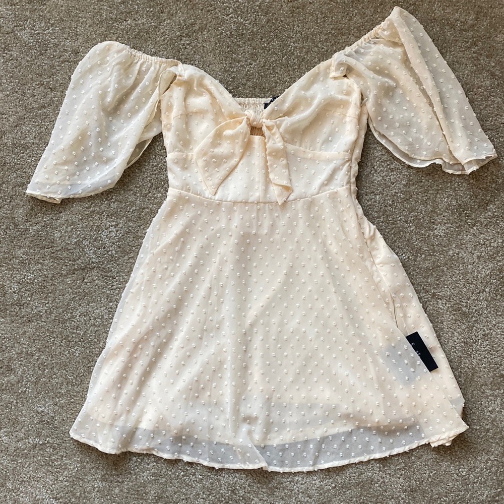 Lulu’s Be a Dear Cream Swiss Dot Tie-Front Dress